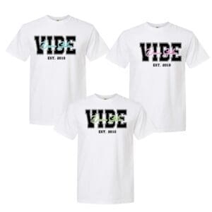 Three white T-shirts with "Vibe" text.